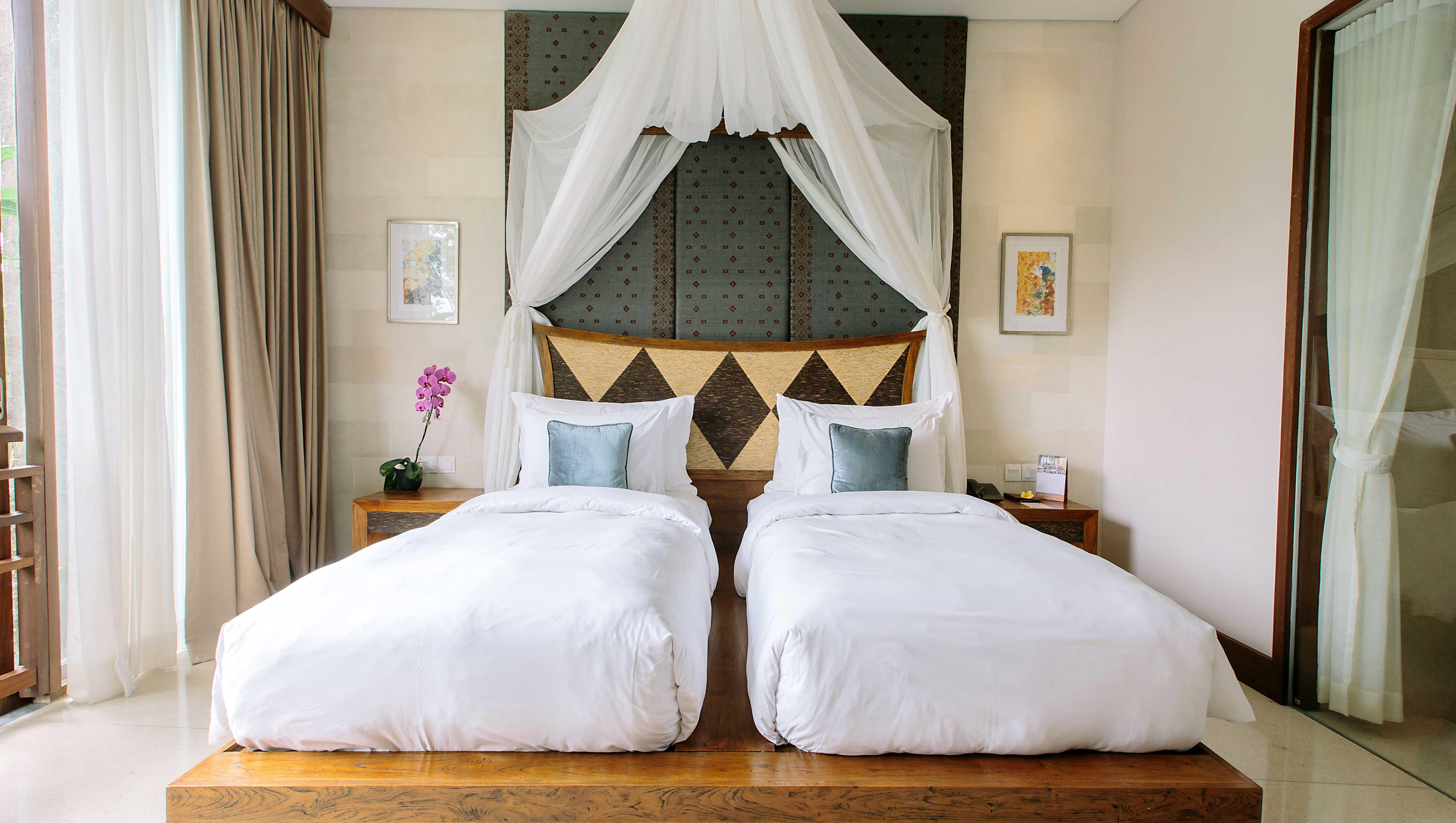 Tejaprana Resort & Spa Ουμπούντ Εξωτερικό φωτογραφία A bed with mosquito netting